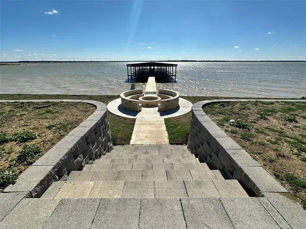 a view of an empty room with glass door