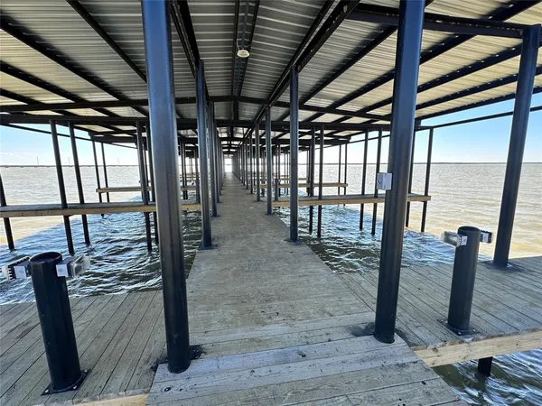 a view of swimming pool with outdoor and seating area