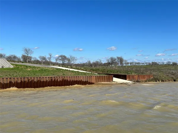 a view of a lake with a mountain in the background