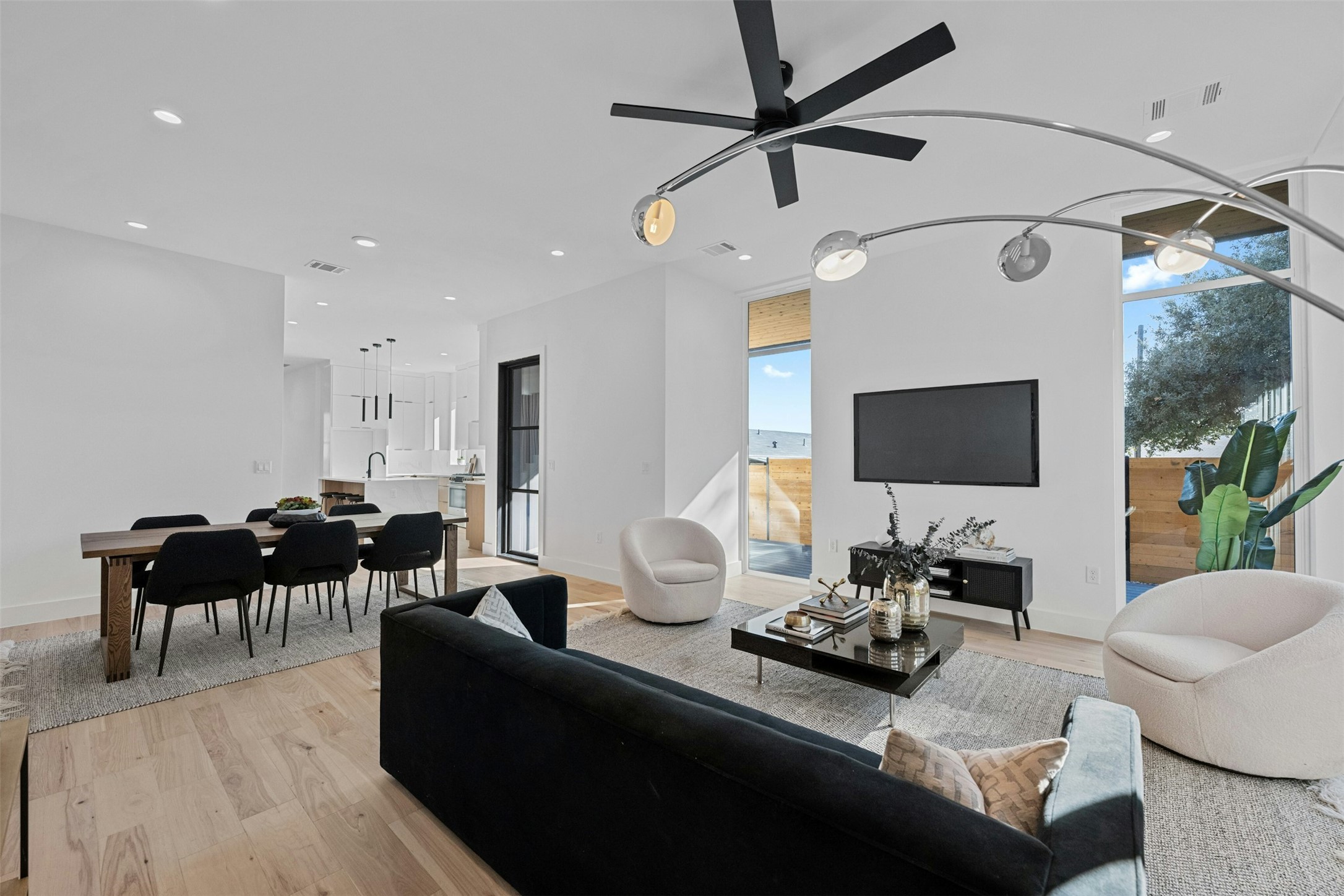 1407 Valleyridge Drive, Unit B Austin, TX 78704 - Photo 4 of 25 Living area with light wood-style flooring, recessed lighting, and ceiling fan
