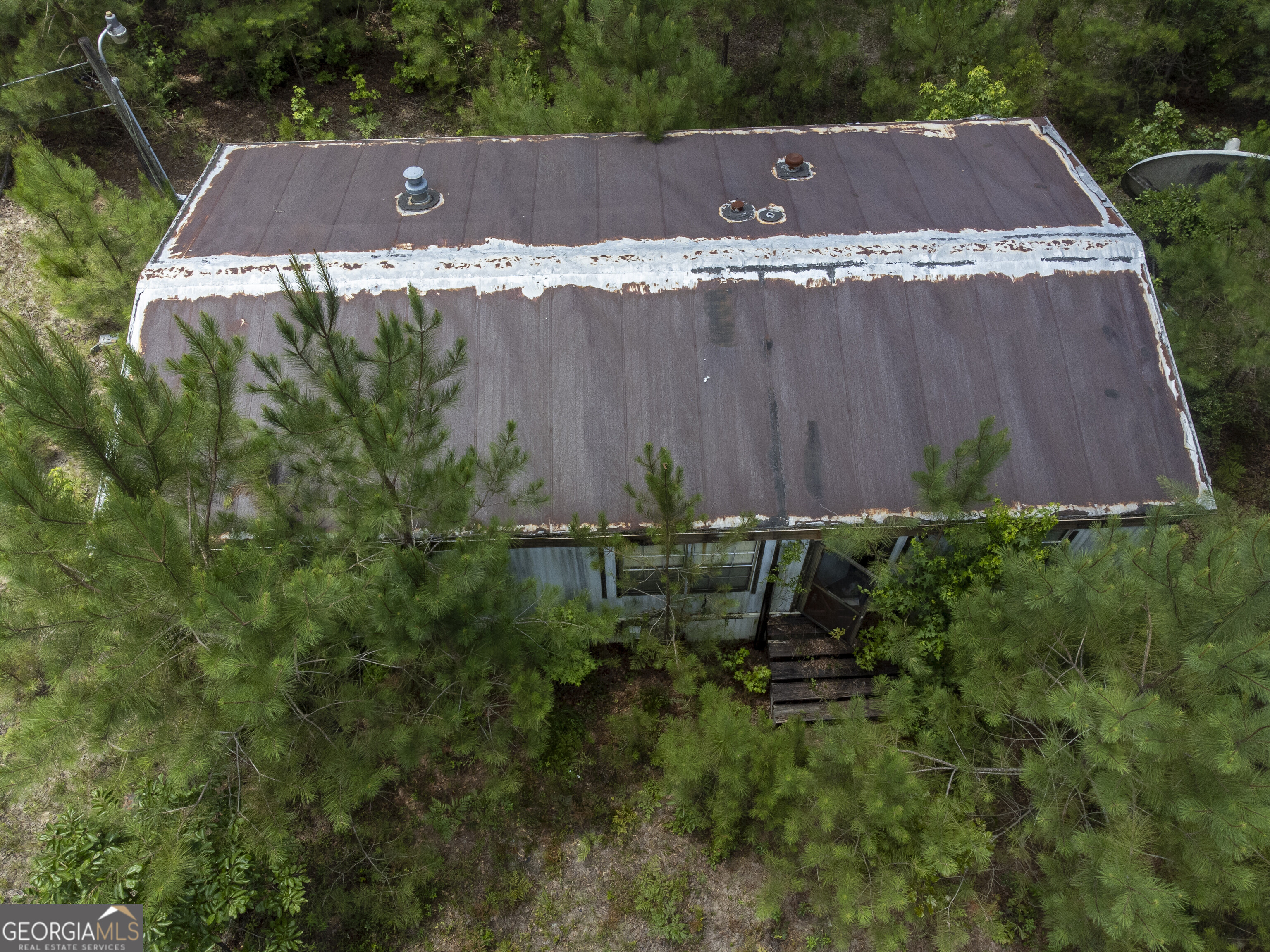 456 Horseshoe Circle Macon, GA 31217 - Photo 14 of 34 an aerial view of a house