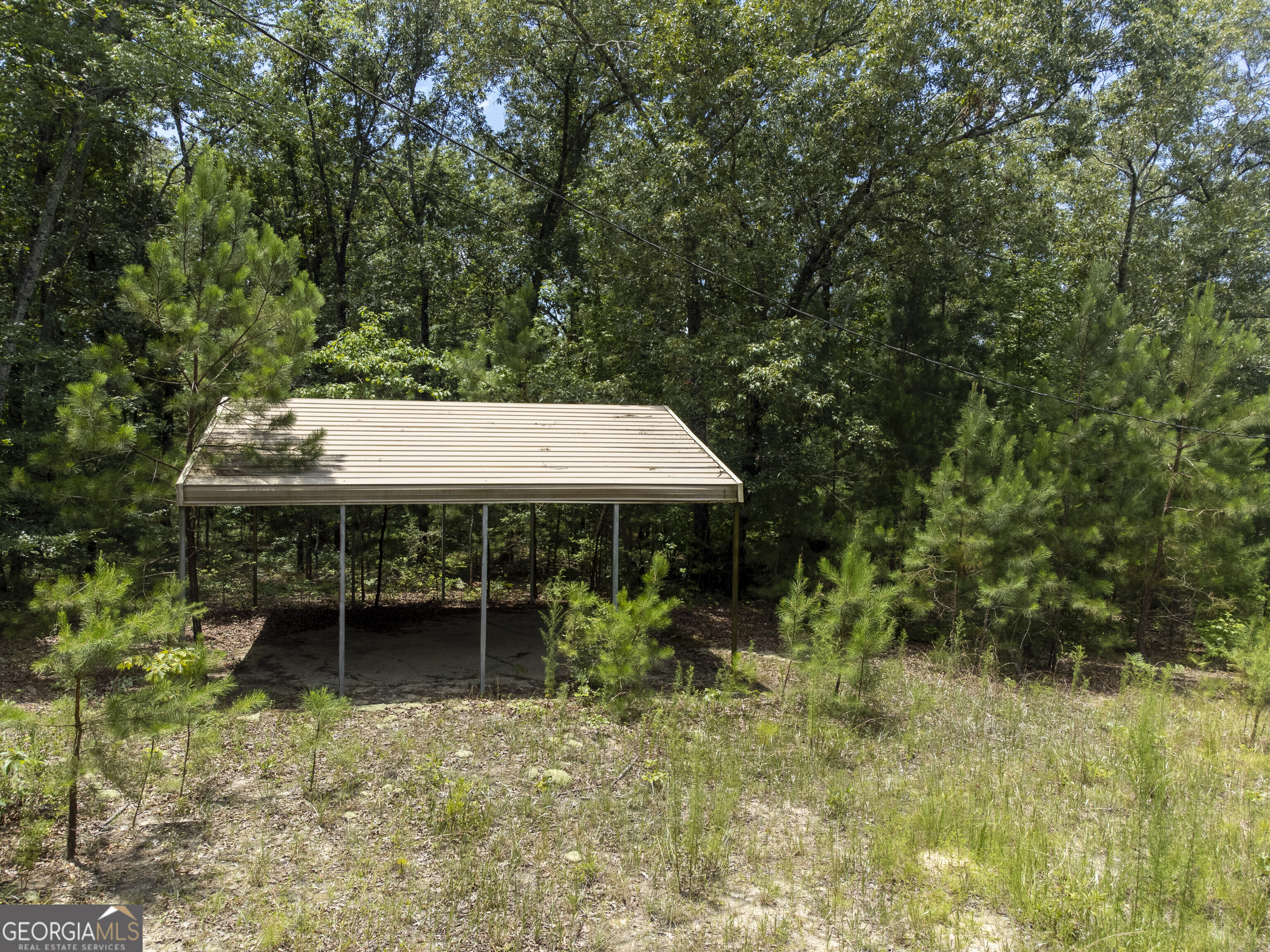 456 Horseshoe Circle Macon, GA 31217 - Photo 9 of 34 a view of a house with backyard and sitting area