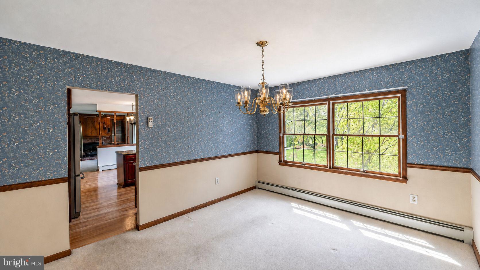223 Trythall Road Elverson, PA 19520 - Photo 19 of 78 a view of empty room with wooden floor and fan