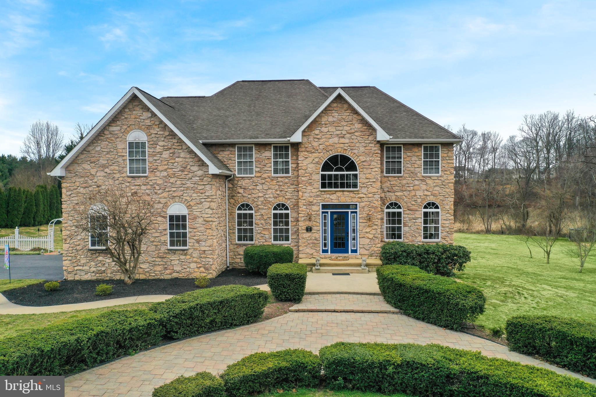 Front with Paver Circle Drive