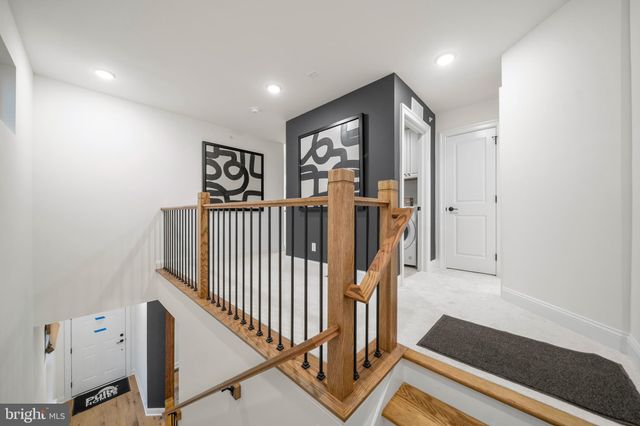 a view of hallway with stairs