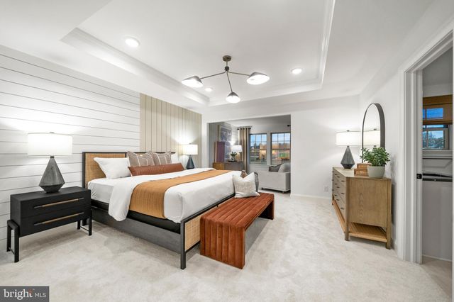 a bedroom with a bed and furniture