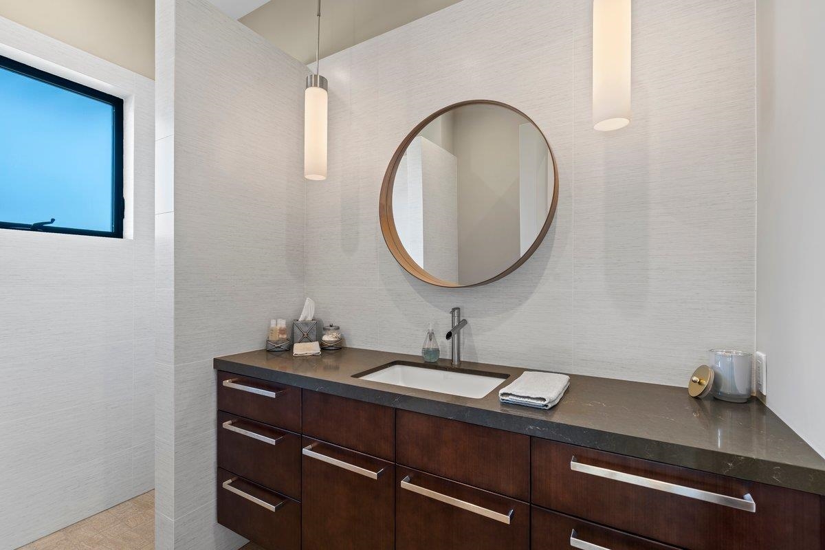 24 Anapuni Loop, Unit 2 Lahaina, HI 96761 - Photo 24 of 50 a bathroom with a sink and a mirror