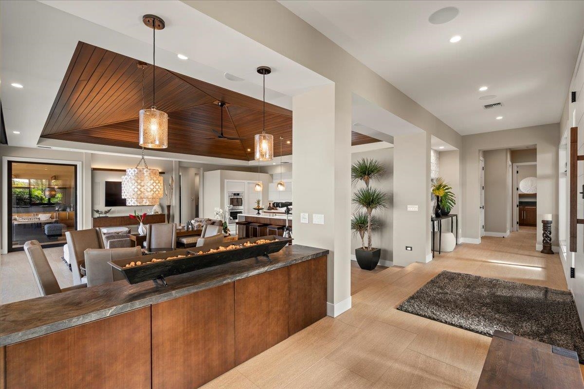 24 Anapuni Loop, Unit 2 Lahaina, HI 96761 - Photo 8 of 50 a kitchen with stainless steel appliances granite countertop sink stove and refrigerator