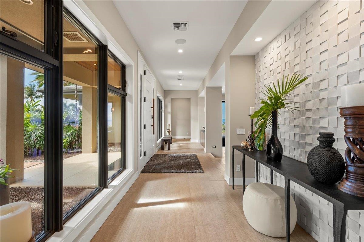 24 Anapuni Loop, Unit 2 Lahaina, HI 96761 - Photo 9 of 50 a lobby with furniture and floor to ceiling window