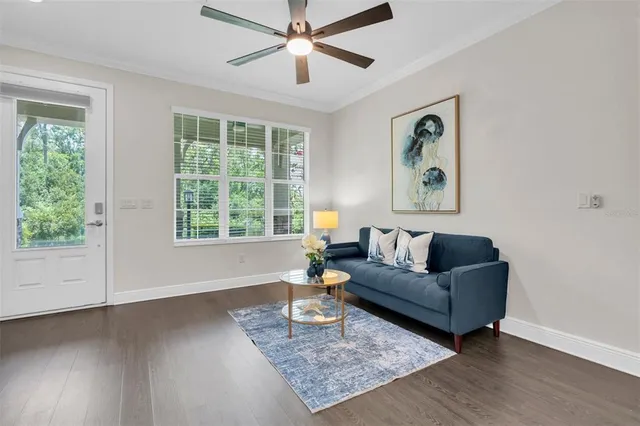 a living room with furniture and a window