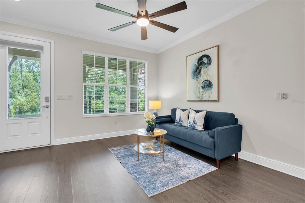 106 Cutlass Way Oldsmar, FL 34677 - Photo 5 of 23 a living room with furniture and a window