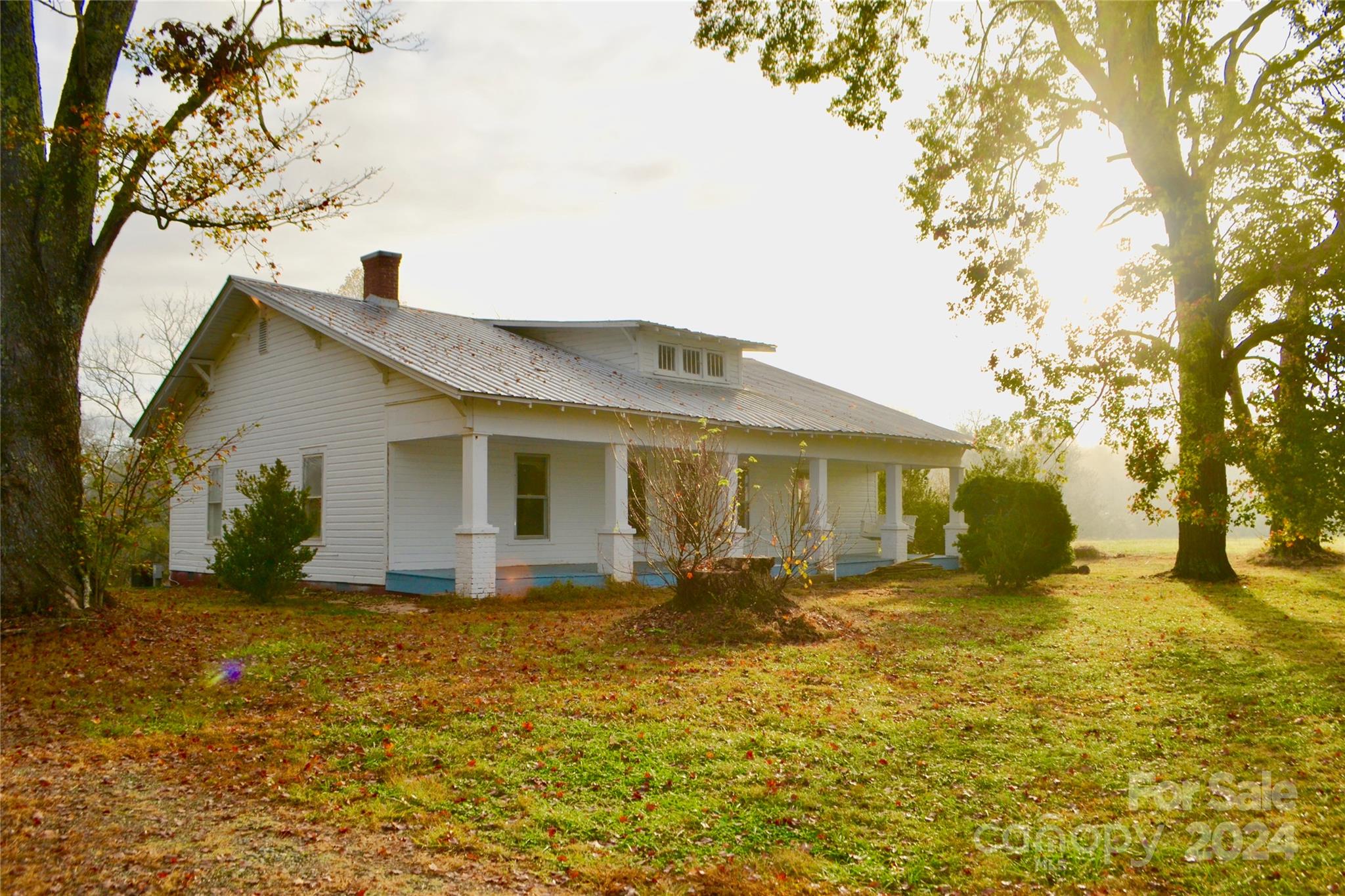 4298 Hudlow Road Rutherfordton, NC 28139 - Photo 14 of 38 a view of a house with a yard