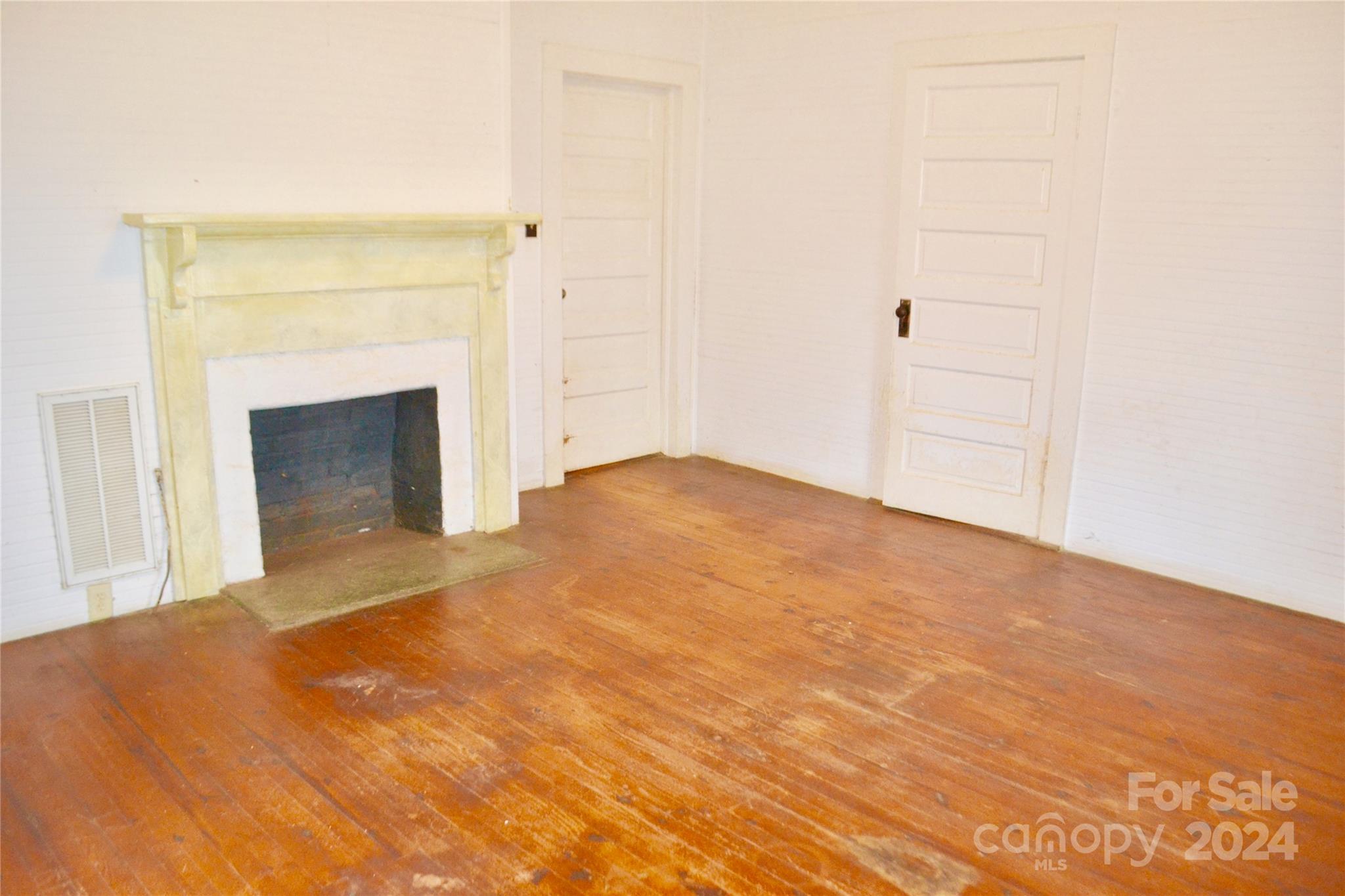 4298 Hudlow Road Rutherfordton, NC 28139 - Photo 25 of 38 a view of empty room with wooden floor