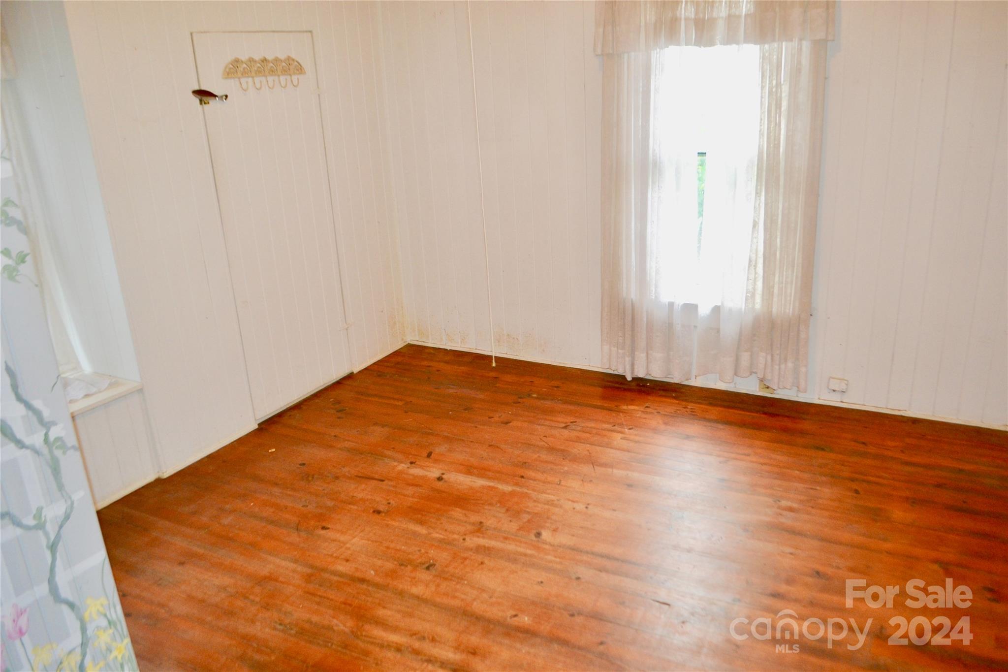 4298 Hudlow Road Rutherfordton, NC 28139 - Photo 27 of 38 a view of empty room with wooden floor