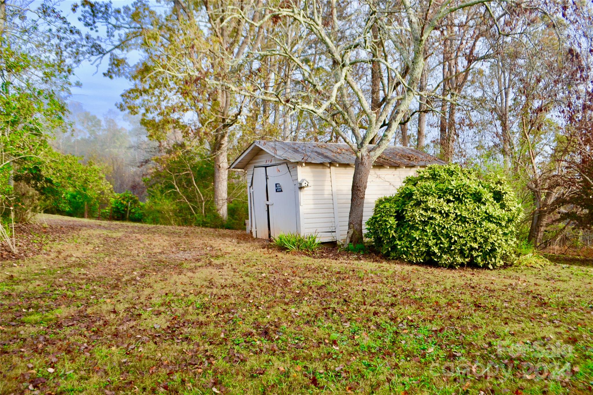4298 Hudlow Road Rutherfordton, NC 28139 - Photo 34 of 38 a front view of a house with a yard