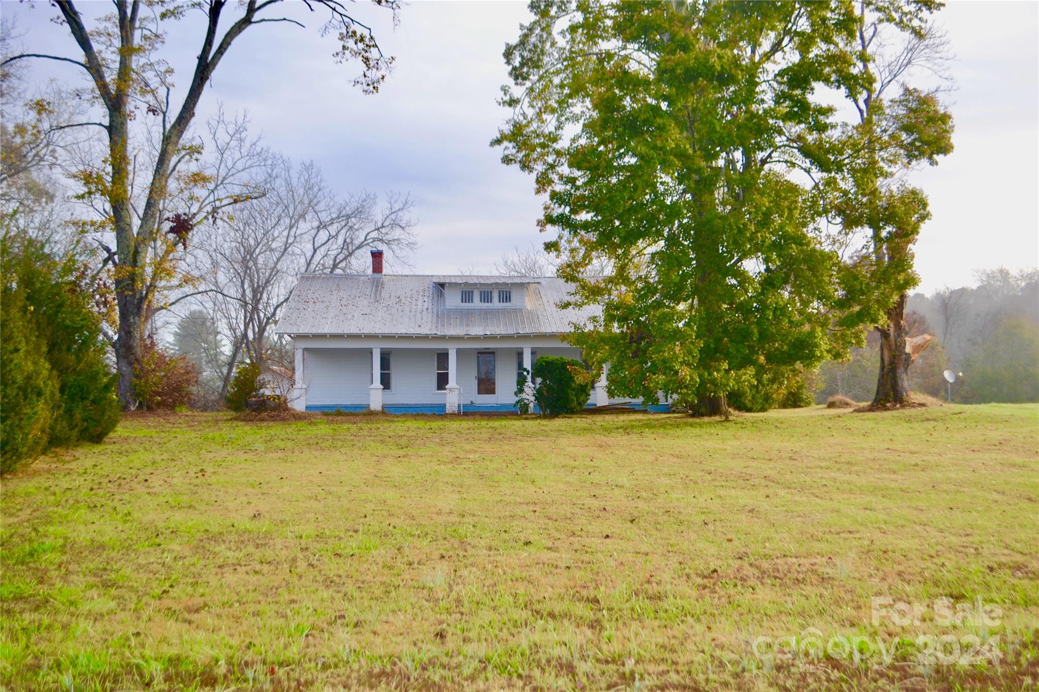 4298 Hudlow Road Rutherfordton, NC 28139 - Photo 4 of 38 a front view of house with yard and trees