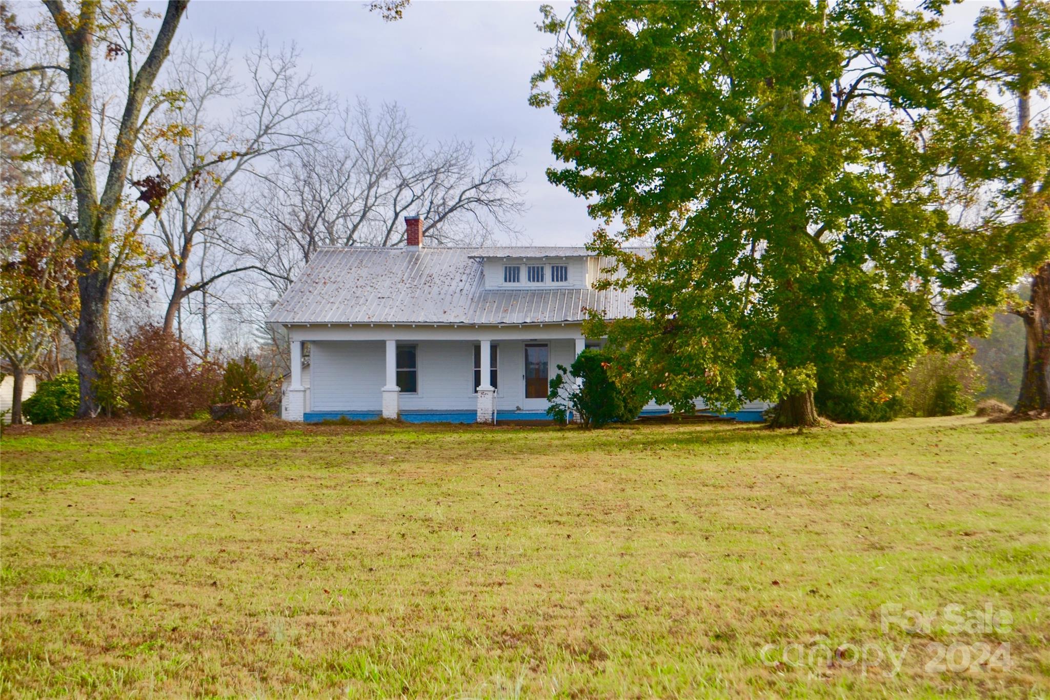 4298 Hudlow Road Rutherfordton, NC 28139 - Photo 6 of 38 a view of a house with a yard