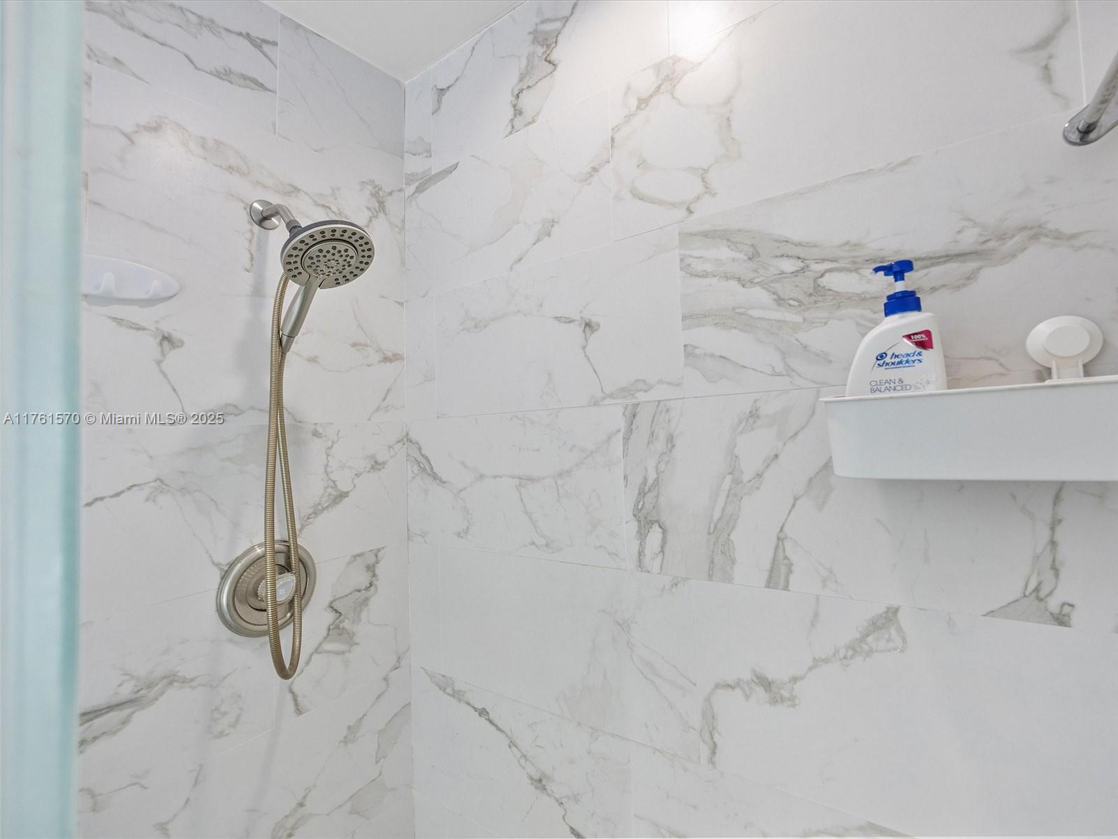 12744 Southwest 261st Terrace Homestead, FL 33032 - Photo 18 of 26 a bathroom with a shower