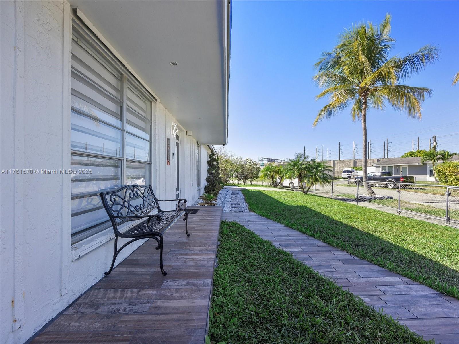 12744 Southwest 261st Terrace Homestead, FL 33032 - Photo 4 of 26 a view of a house with backyard and sitting area