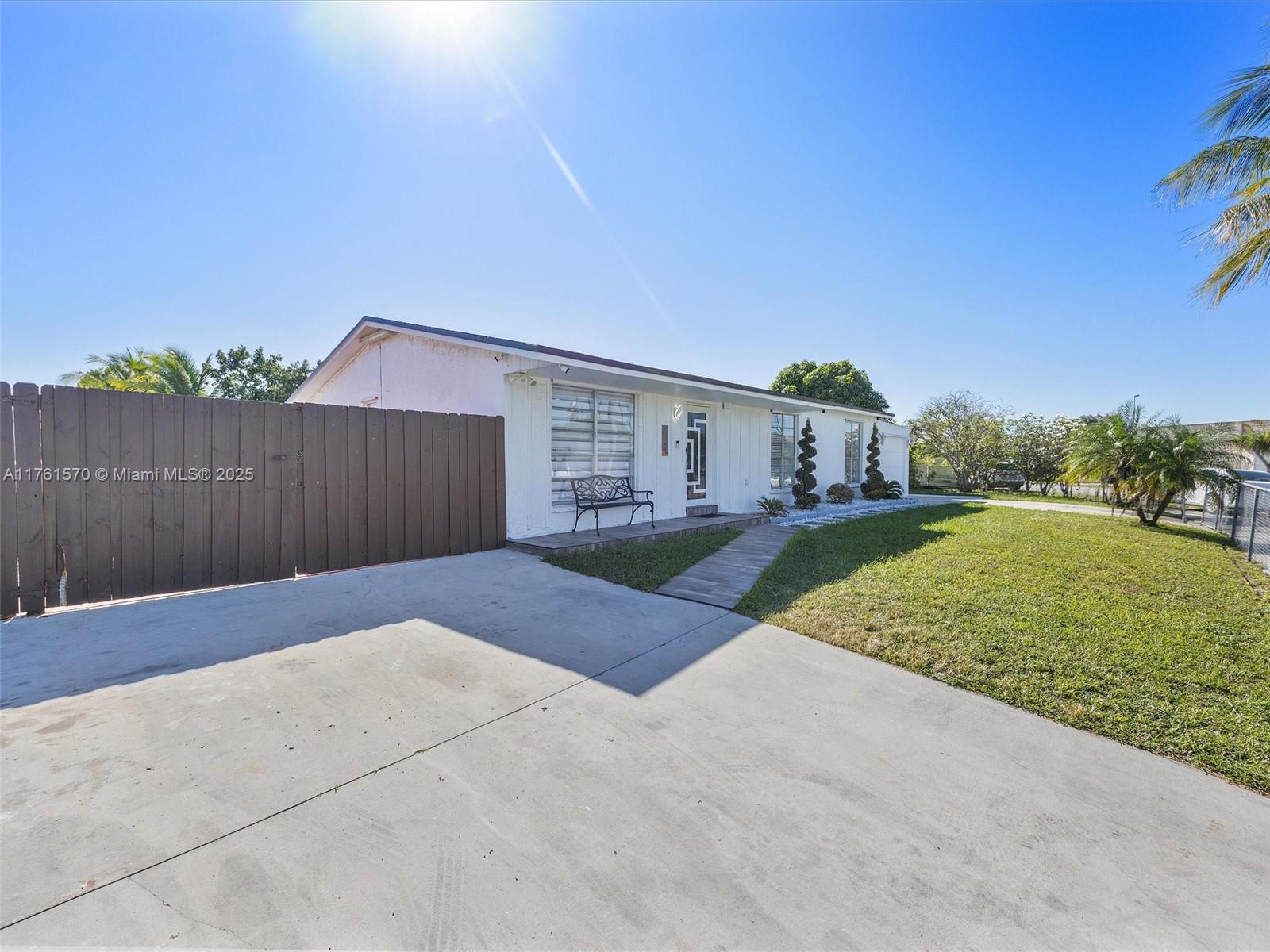 12744 Southwest 261st Terrace Homestead, FL 33032 - Photo 5 of 26 a view of outdoor space and yard