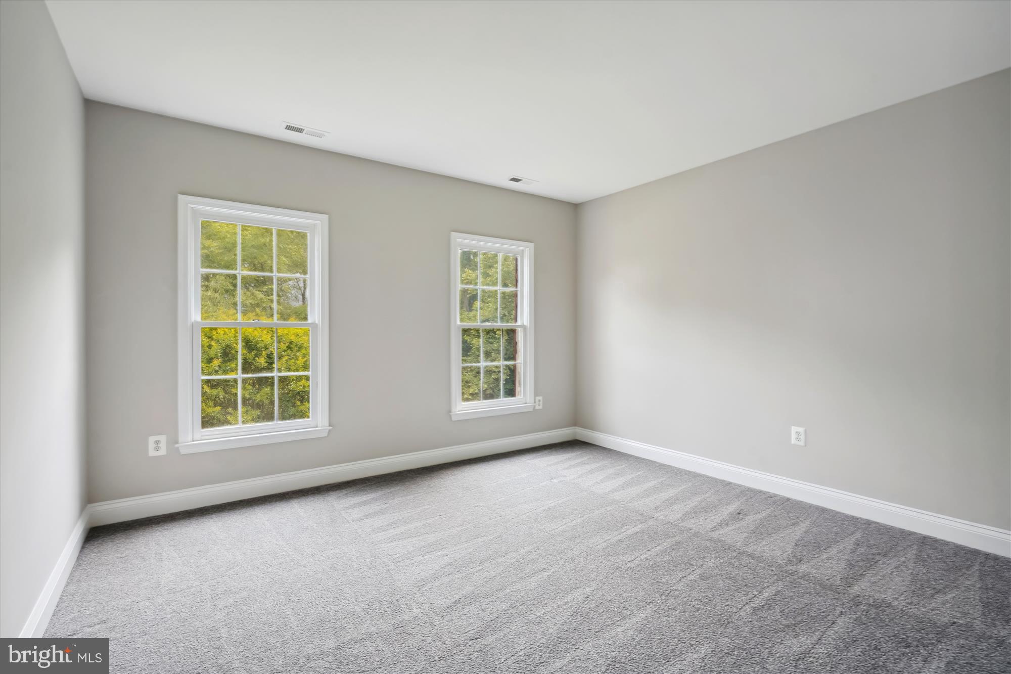 8757 Center Road Springfield, VA 22152 - Photo 14 of 21 an empty room with windows