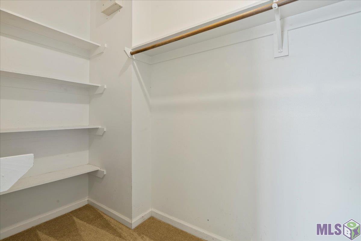 10223 Springpark Avenue Baton Rouge, LA 70810 - Photo 9 of 15 Large walk-in closet in master suite