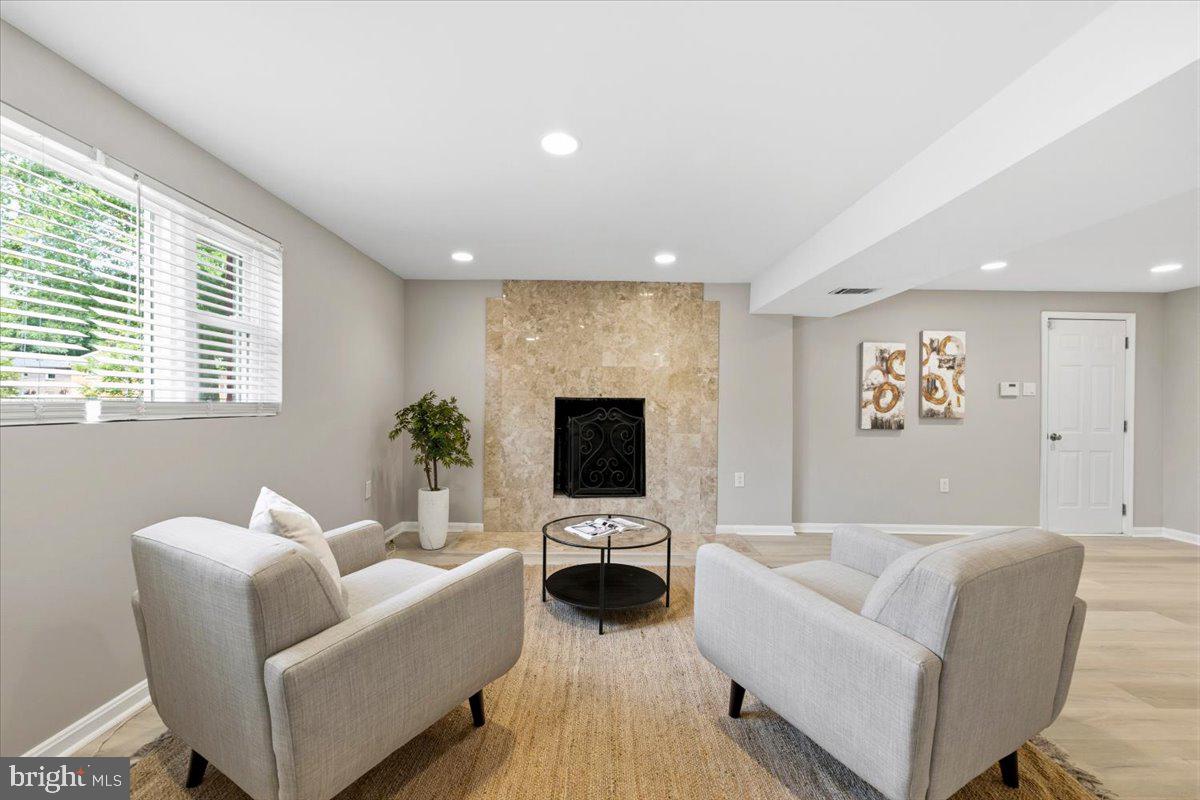 5804 Spell Road Clinton, MD 20735 - Photo 7 of 58 Lower Level Rec Room with Fireplace