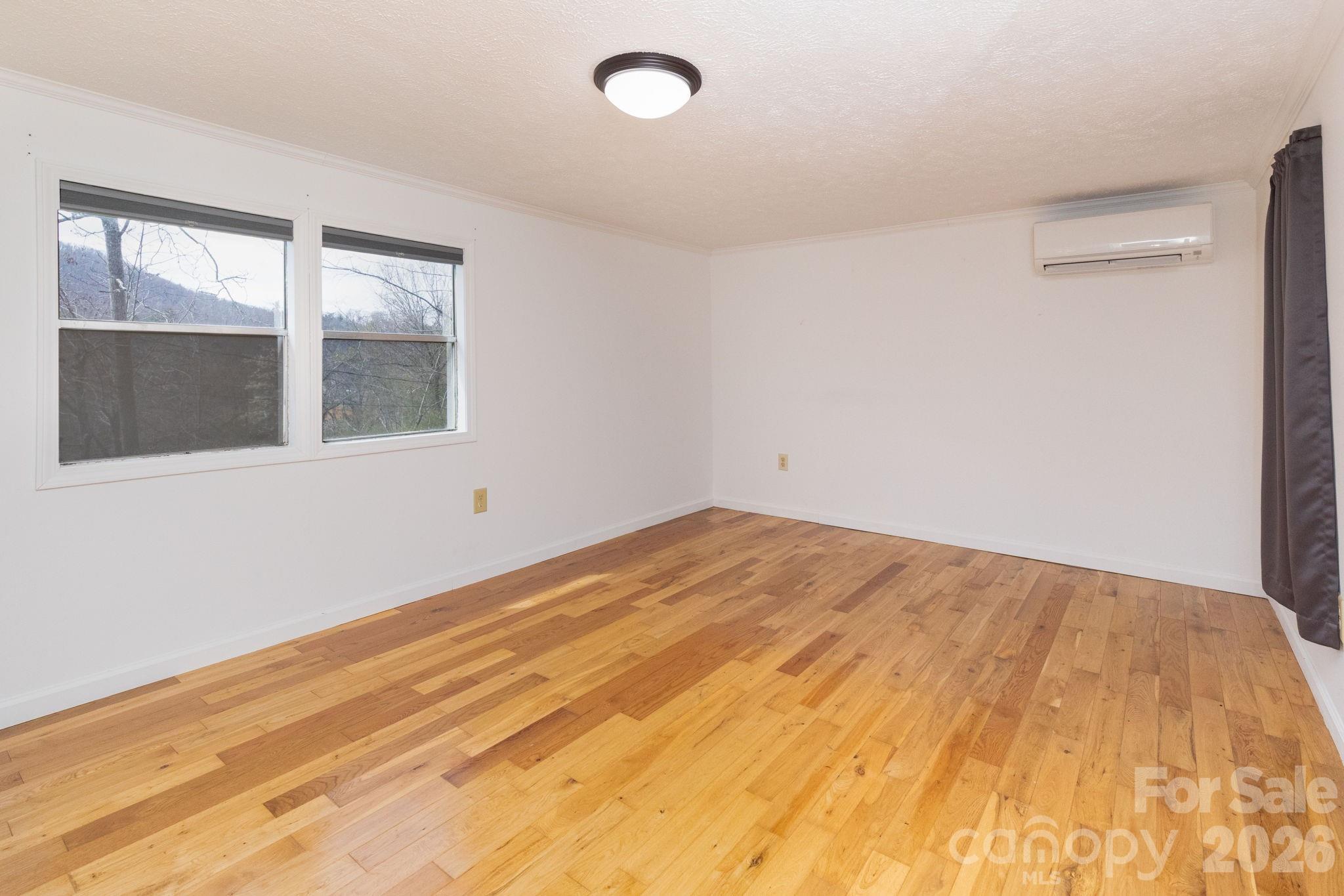 20 Ox Crk Road Weaverville, NC 28787 - Photo 11 of 22 a view of empty room with wooden floor