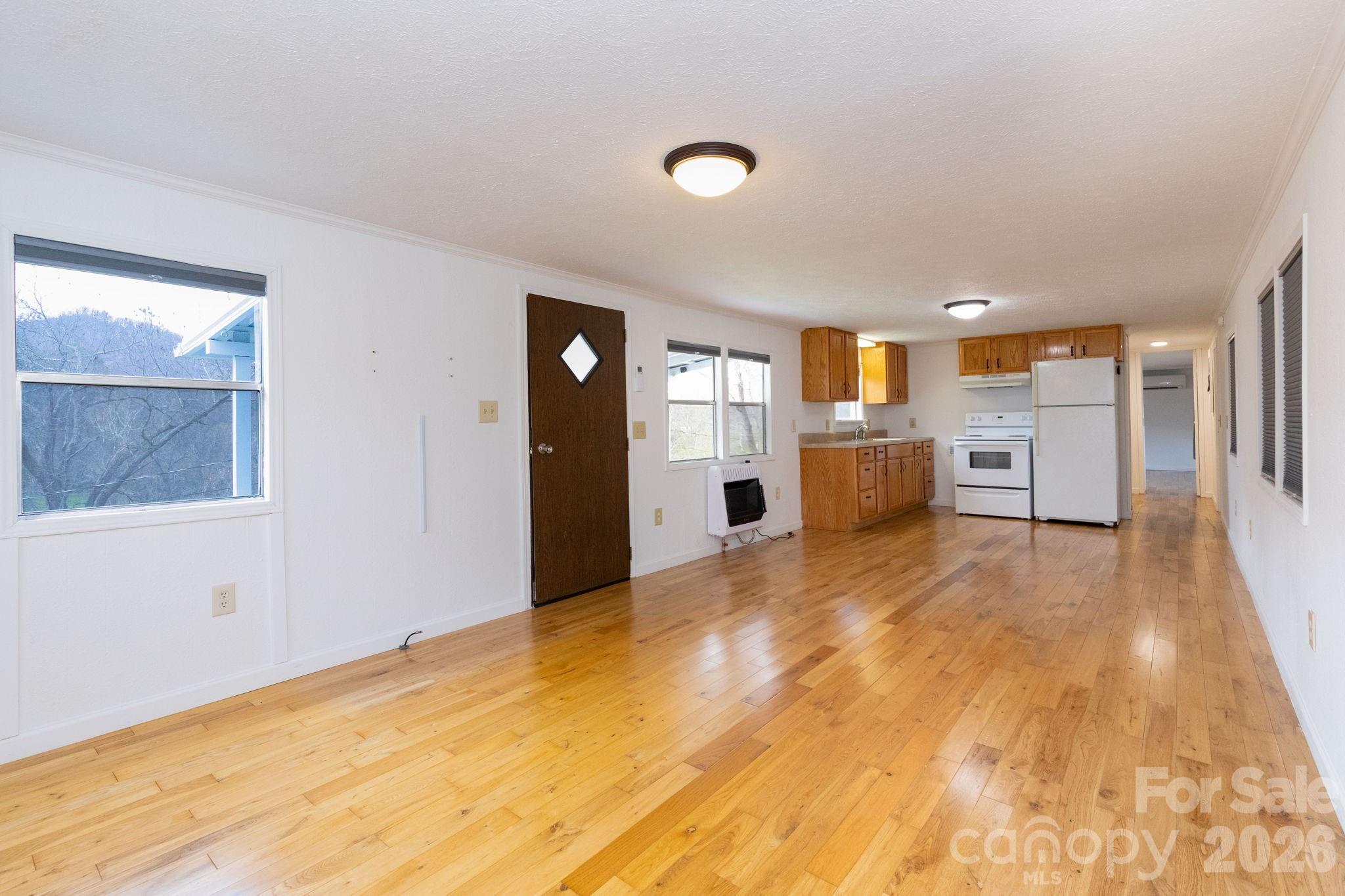 20 Ox Crk Road Weaverville, NC 28787 - Photo 18 of 22 a view of a kitchen with a sink and a stove