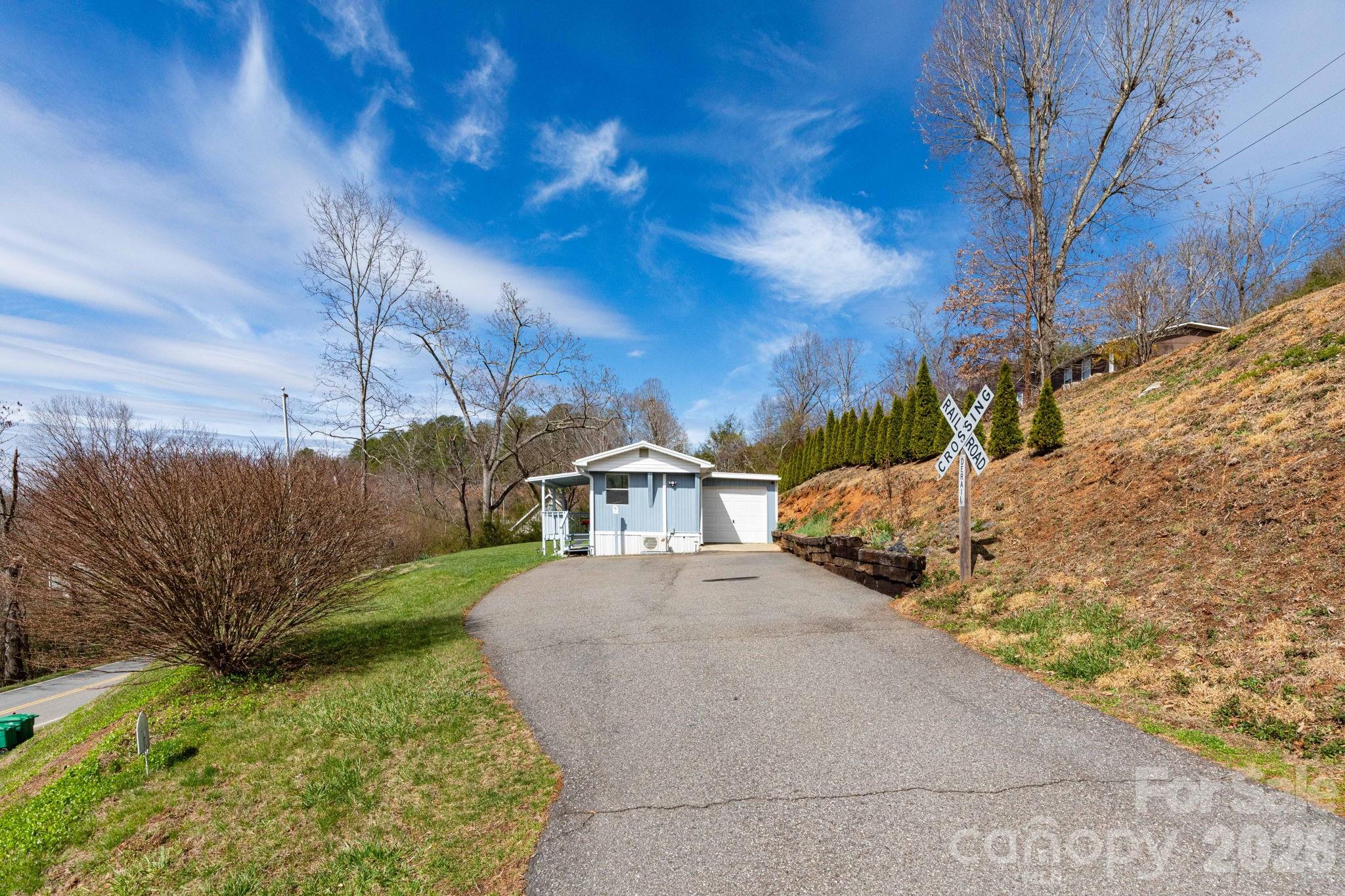 20 Ox Crk Road Weaverville, NC 28787 - Photo 2 of 22 a view of a house with a yard