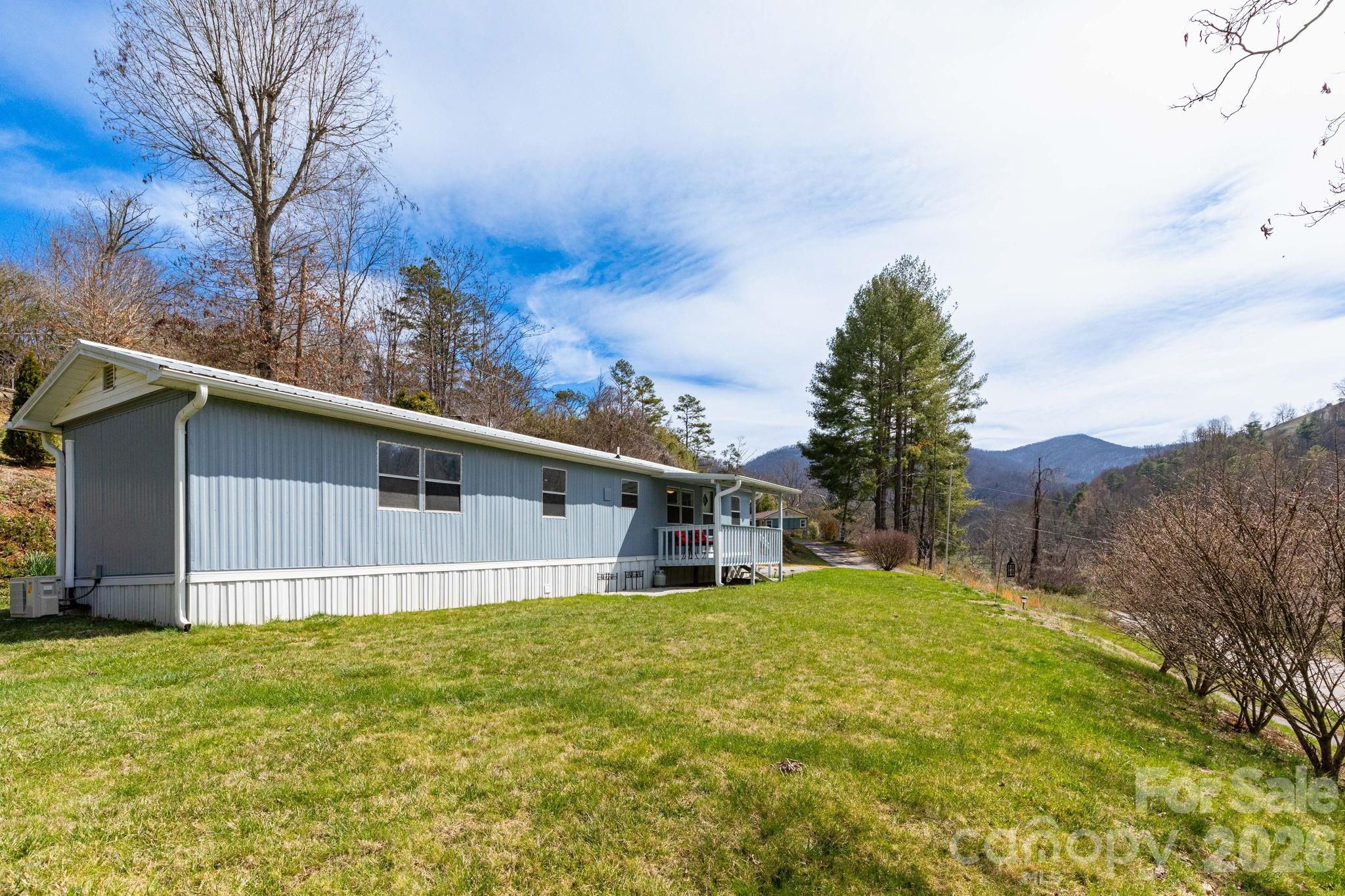 20 Ox Crk Road Weaverville, NC 28787 - Photo 4 of 22 a view of a house with a yard