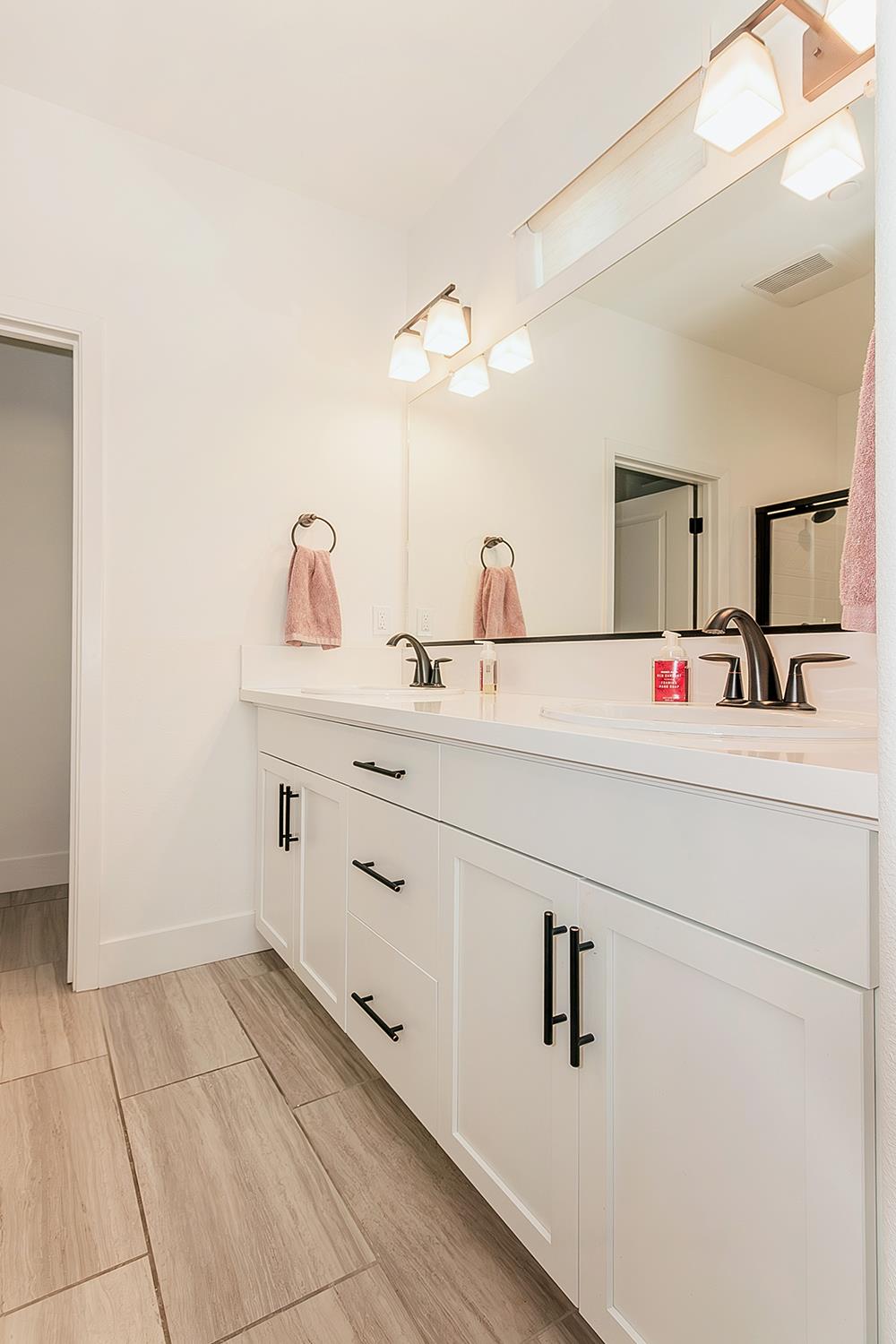 4593 Orchard Hills Road Madera, CA 93636 - Photo 10 of 21 Primary Bathroom with dual sinks