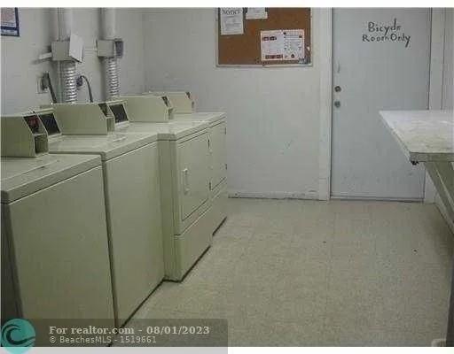 4131 Northwest 88th Avenue, Unit 206 Coral Springs, FL 33065 - Photo 28 of 41 a utility room with dryer and washer