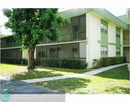 4131 Northwest 88th Avenue, Unit 206 Coral Springs, FL 33065 - Photo 29 of 41 a view of house with backyard