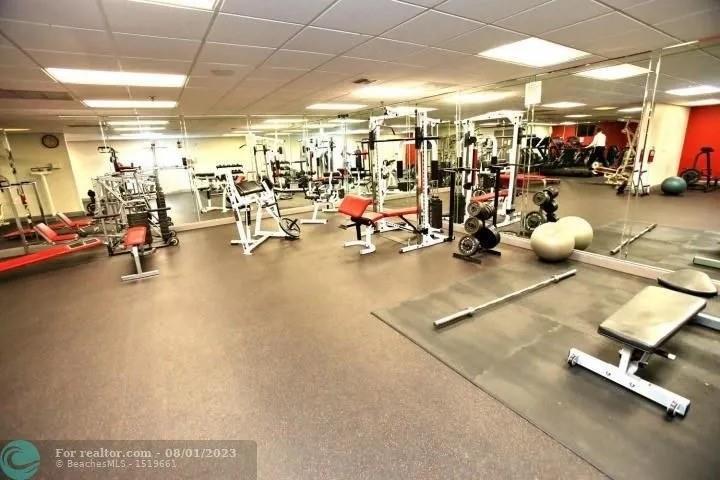 4131 Northwest 88th Avenue, Unit 206 Coral Springs, FL 33065 - Photo 31 of 41 a view of a room with gym equipment