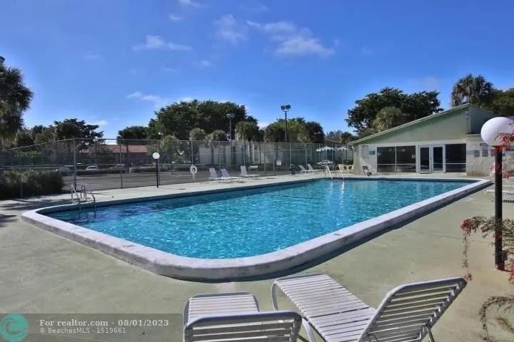 4131 Northwest 88th Avenue, Unit 206 Coral Springs, FL 33065 - Photo 36 of 41 a view of outdoor space and swimming pool