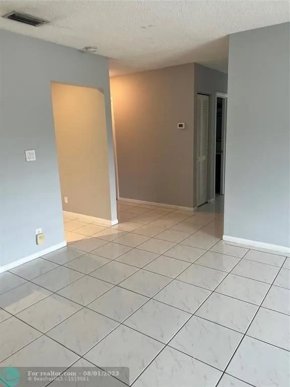 4131 Northwest 88th Avenue, Unit 206 Coral Springs, FL 33065 - Photo 7 of 41 a view of empty room