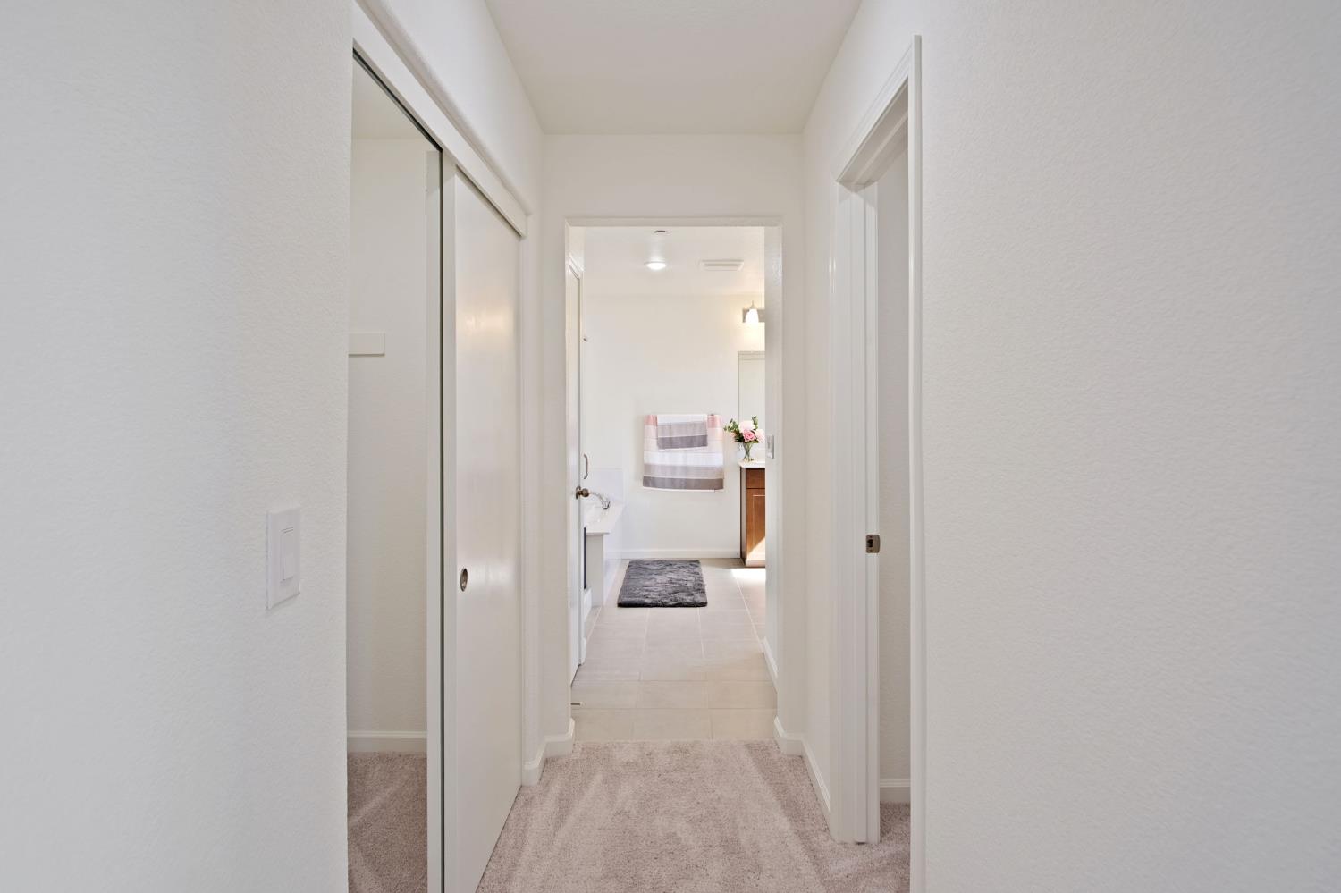1432 Meridian Street Manteca, CA 95337 - Photo 25 of 42 a view of a bathroom from a hallway