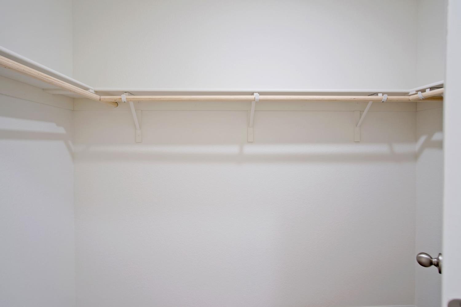 1432 Meridian Street Manteca, CA 95337 - Photo 26 of 42 a view of a room with shelf on the wall