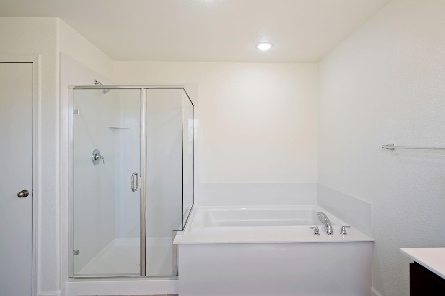 1432 Meridian Street Manteca, CA 95337 - Photo 29 of 42 a bathroom with a shower and a tub