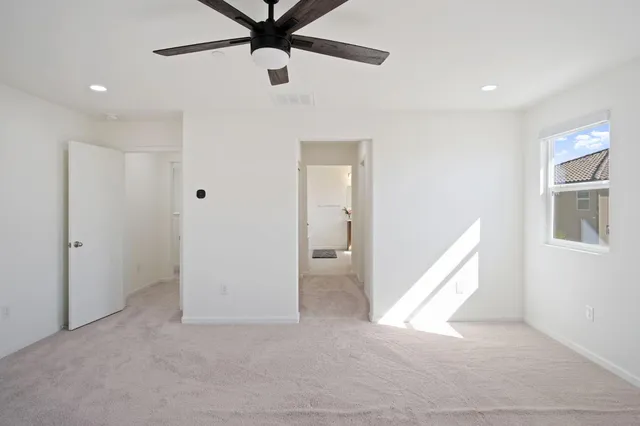 a view of a hallway with closet