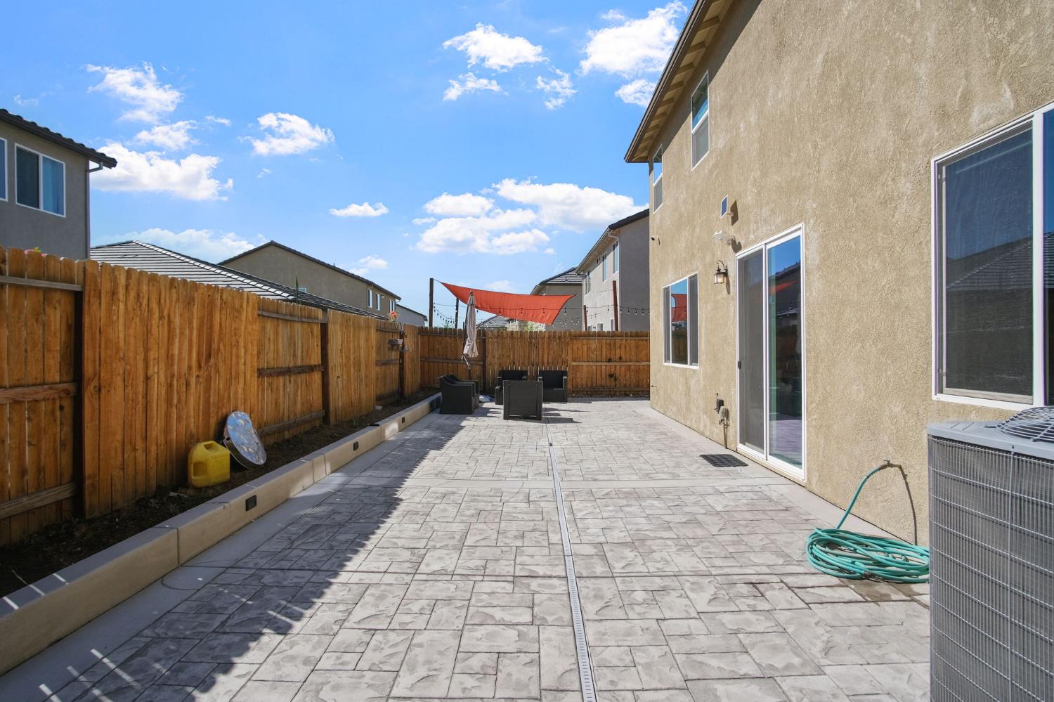 1432 Meridian Street Manteca, CA 95337 - Photo 33 of 42 a view of a street with wooden fence
