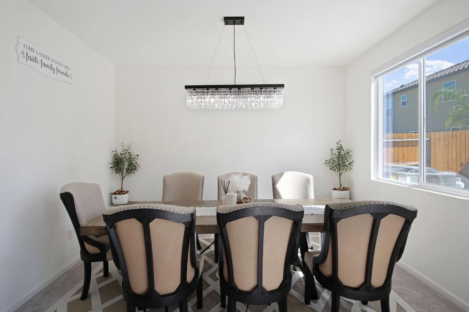 1432 Meridian Street Manteca, CA 95337 - Photo 8 of 42 a view of a dining room with furniture window and outside view