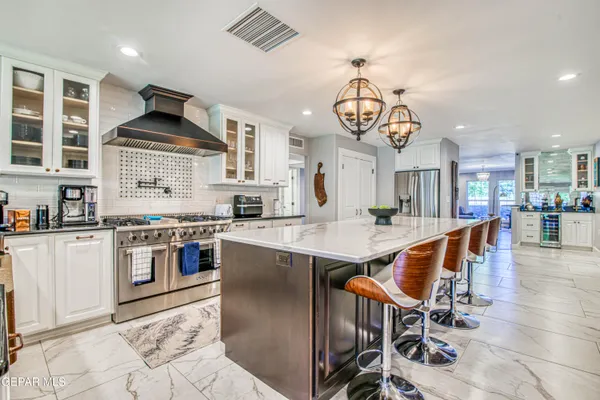 a view of a bedroom from a hallway