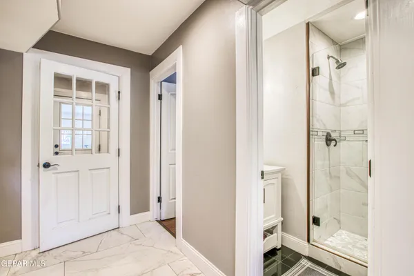 a white bath tub sitting in a bathroom