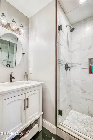 a white bath tub sitting in a bathroom