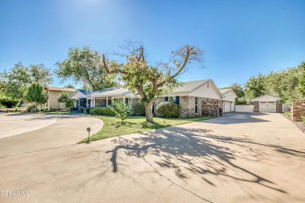 a view of living room with furniture and a flat screen tv
