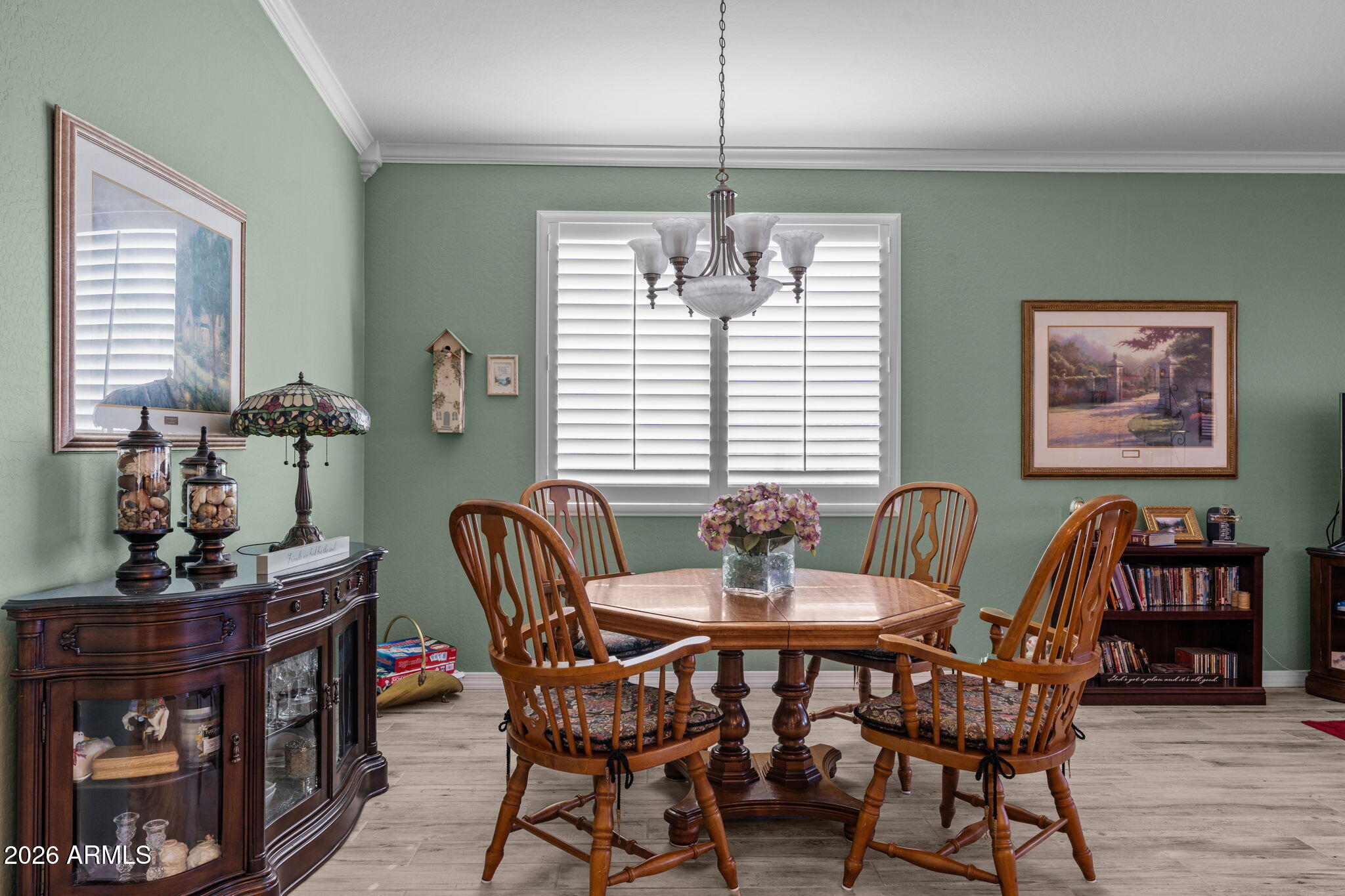 4320 Buffalo Ridge Wickenburg, AZ 85390 - Photo 14 of 57 a view of a dining room with furniture window and wooden floor