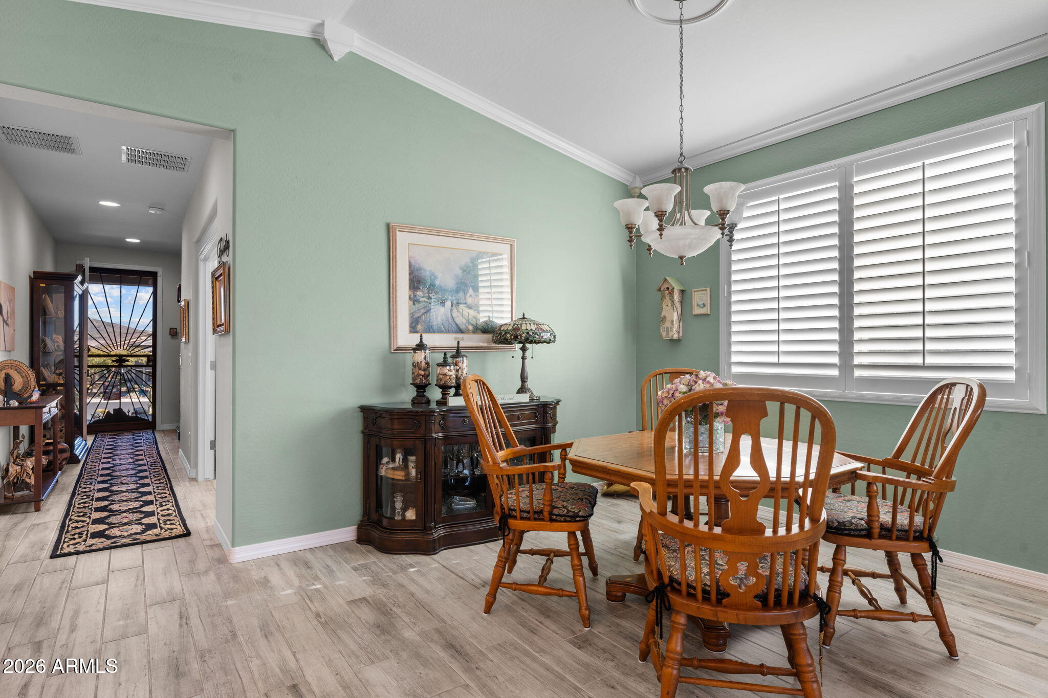 4320 Buffalo Ridge Wickenburg, AZ 85390 - Photo 15 of 57 a view of a dining room with furniture window and wooden floor