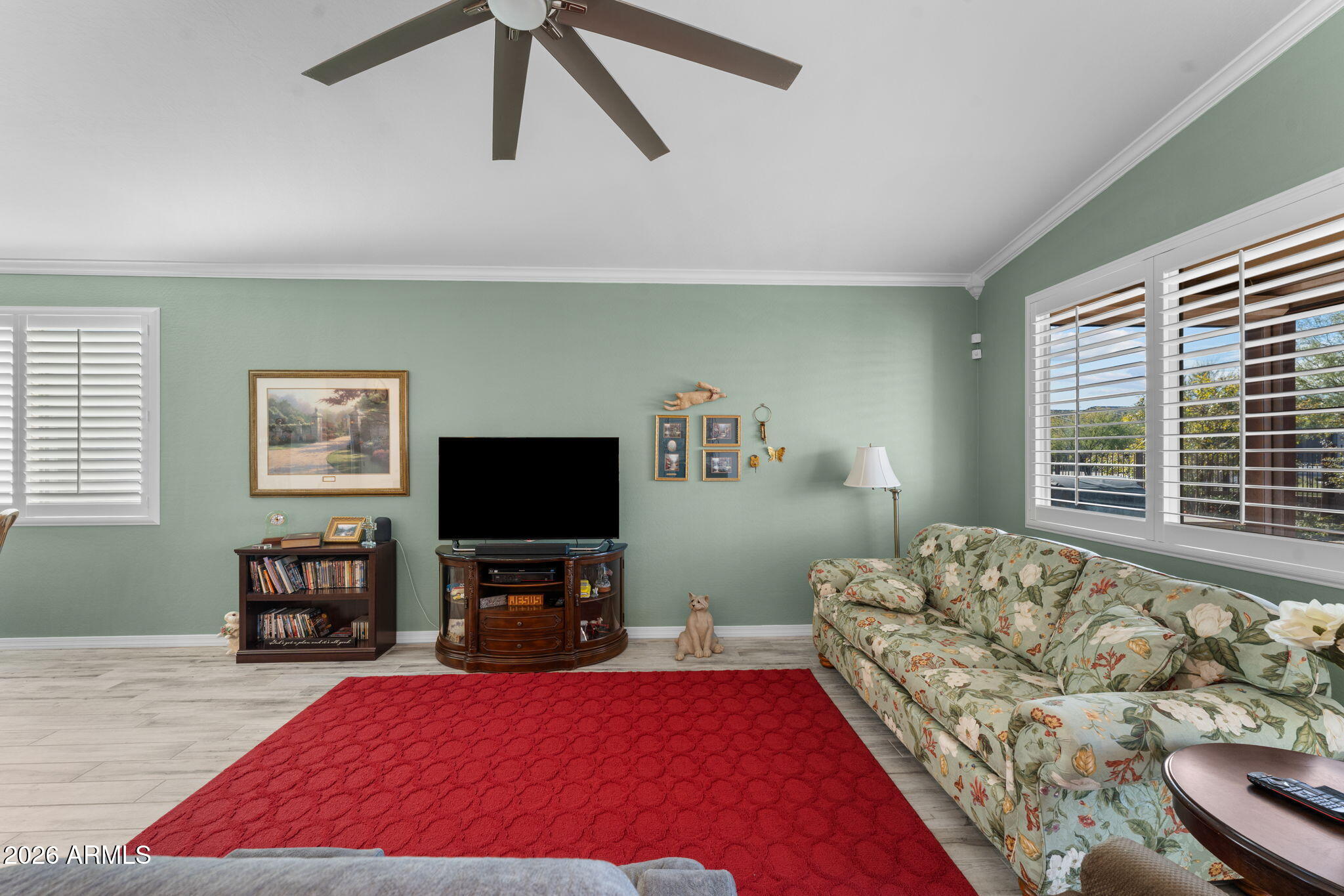 4320 Buffalo Ridge Wickenburg, AZ 85390 - Photo 18 of 57 a living room with furniture and a flat screen tv